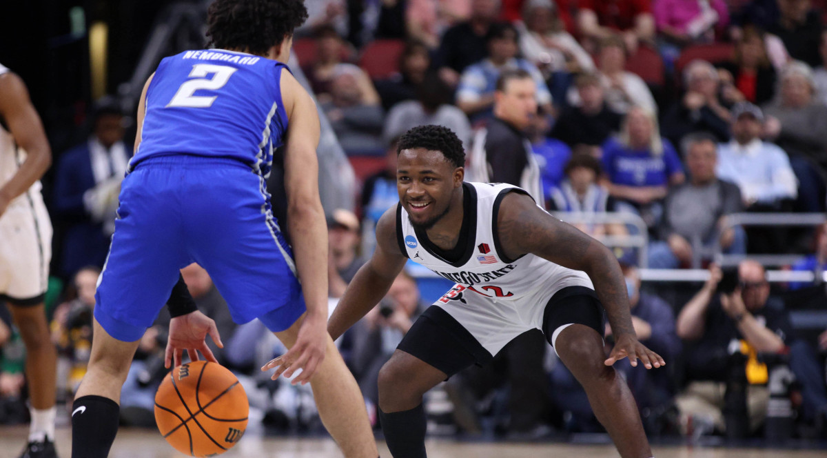 San Diego State guard Darrion Trammell defends Creighton guard Ryan Nembhard